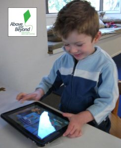 Child using iPad.